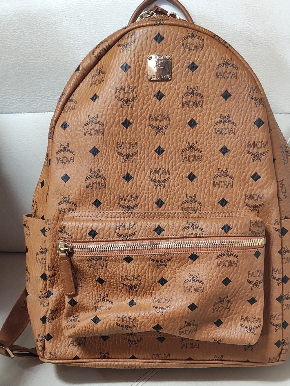 MCM Cognac Logo Print Leather Backpack with Gold Plate